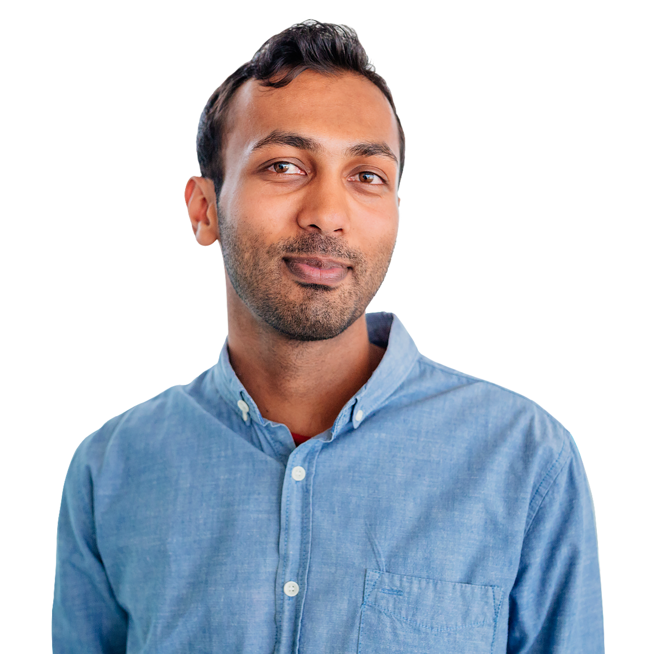 Smiling man wearing blue collared shirt